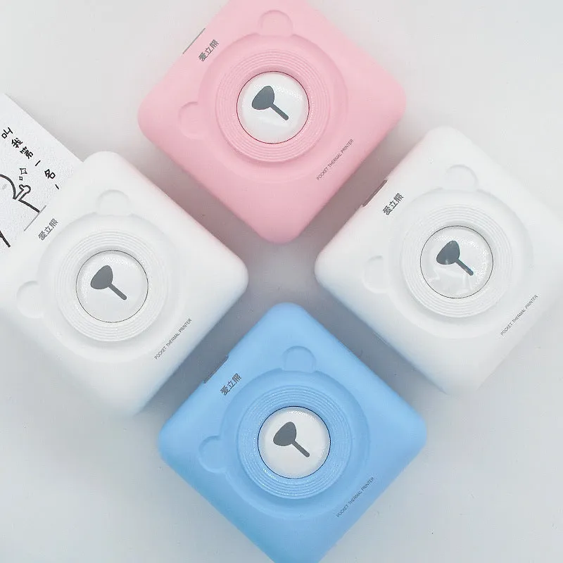 Portable mini thermal label printer in white, 7.9 x 7.9 x 4.2cm, with rechargeable battery and thermal paper roll