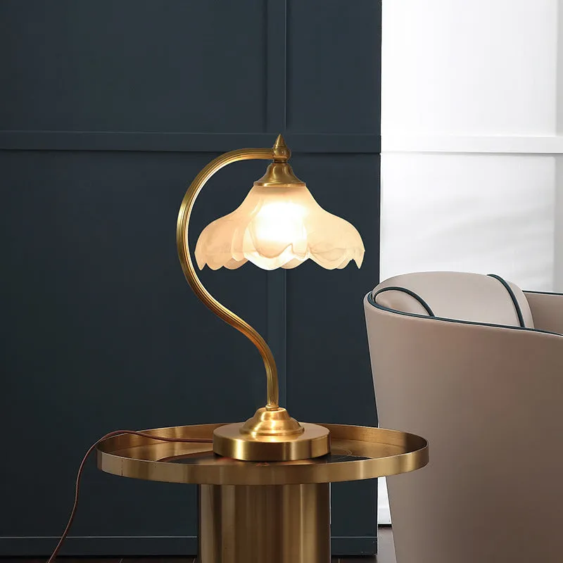 Gold copper and glass bedside lamp with fabric shade, 23cm diameter, 42cm height, on bedside table