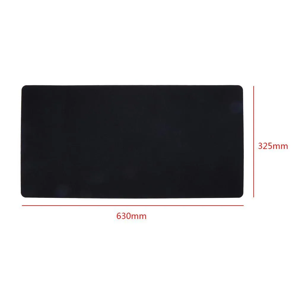 Large felt mouse pad in black on office desk with keyboard and mouse, 325x635mm