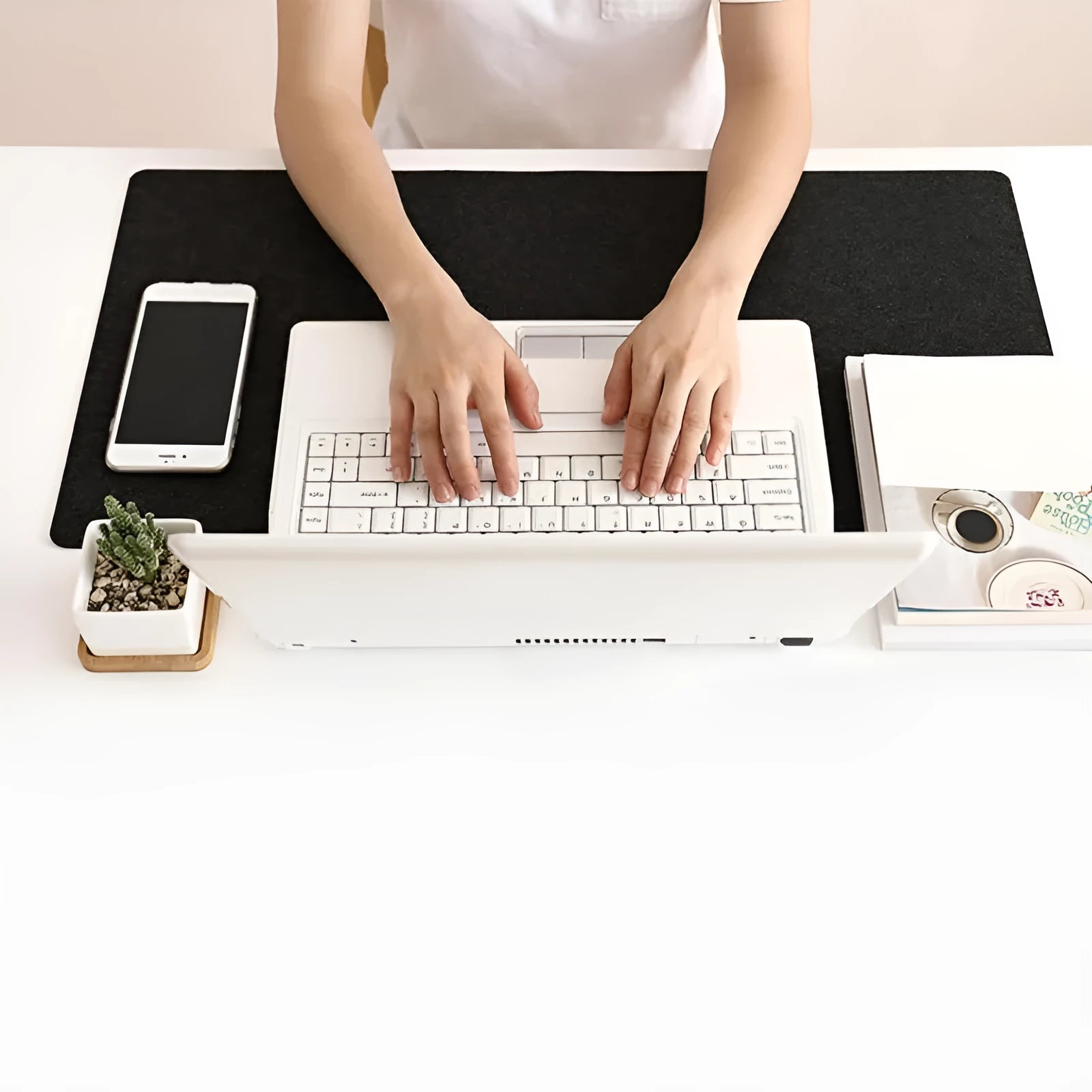 Large felt mouse pad in black on office desk with keyboard and mouse, 325x635mm