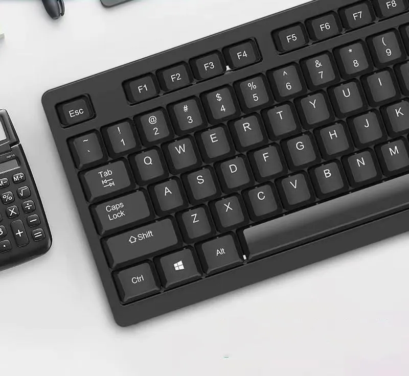 KM160 black wired USB keyboard and mouse set with 1.5m cable on desk