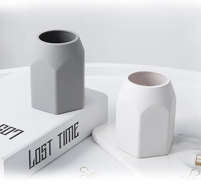 Round solid silicone pen holder in white, 80x95mm, on a clean desk with pens