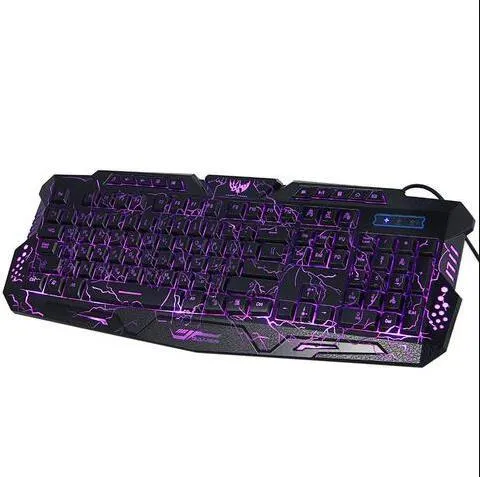 Black 3-colour LED backlit gaming keyboard with ergonomic S-shaped design and adjustable stand on desk