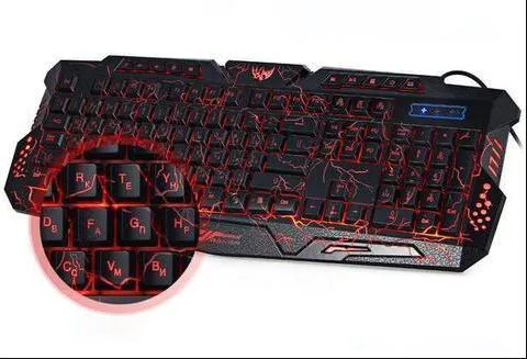 Black 3-colour LED backlit gaming keyboard with ergonomic S-shaped design and adjustable stand on desk