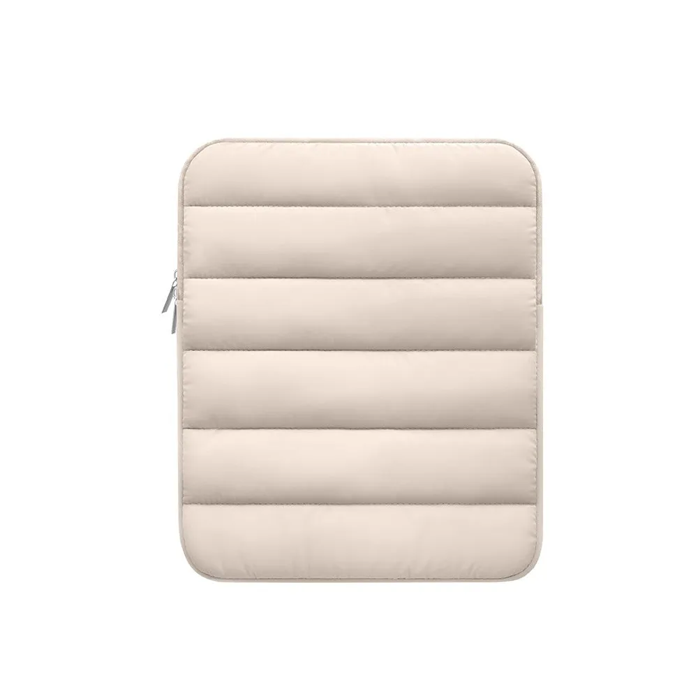 Black puff bag laptop sleeve with elastic sides for a 9.7 to 11 inch MacBook.