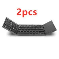 Folding Bluetooth keyboard with 64 ABS keys and black colour, folded for travel