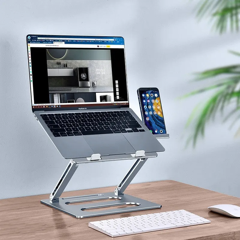 Silver adjustable aluminum laptop stand with laptop on desk at 340mm height