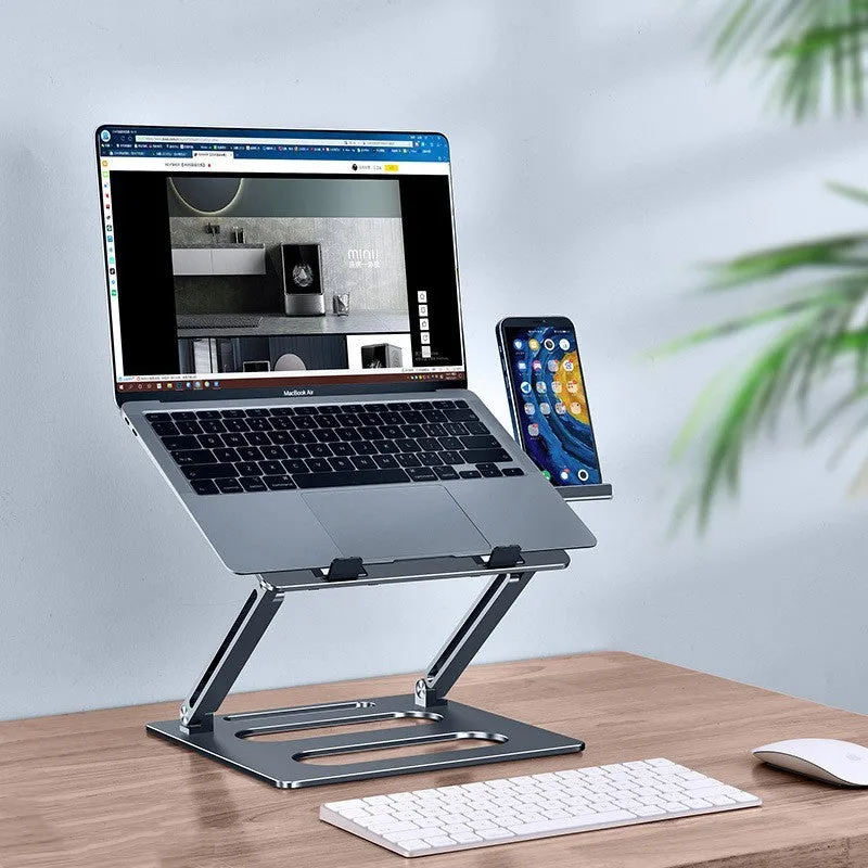 Silver adjustable aluminum laptop stand with laptop on desk at 340mm height