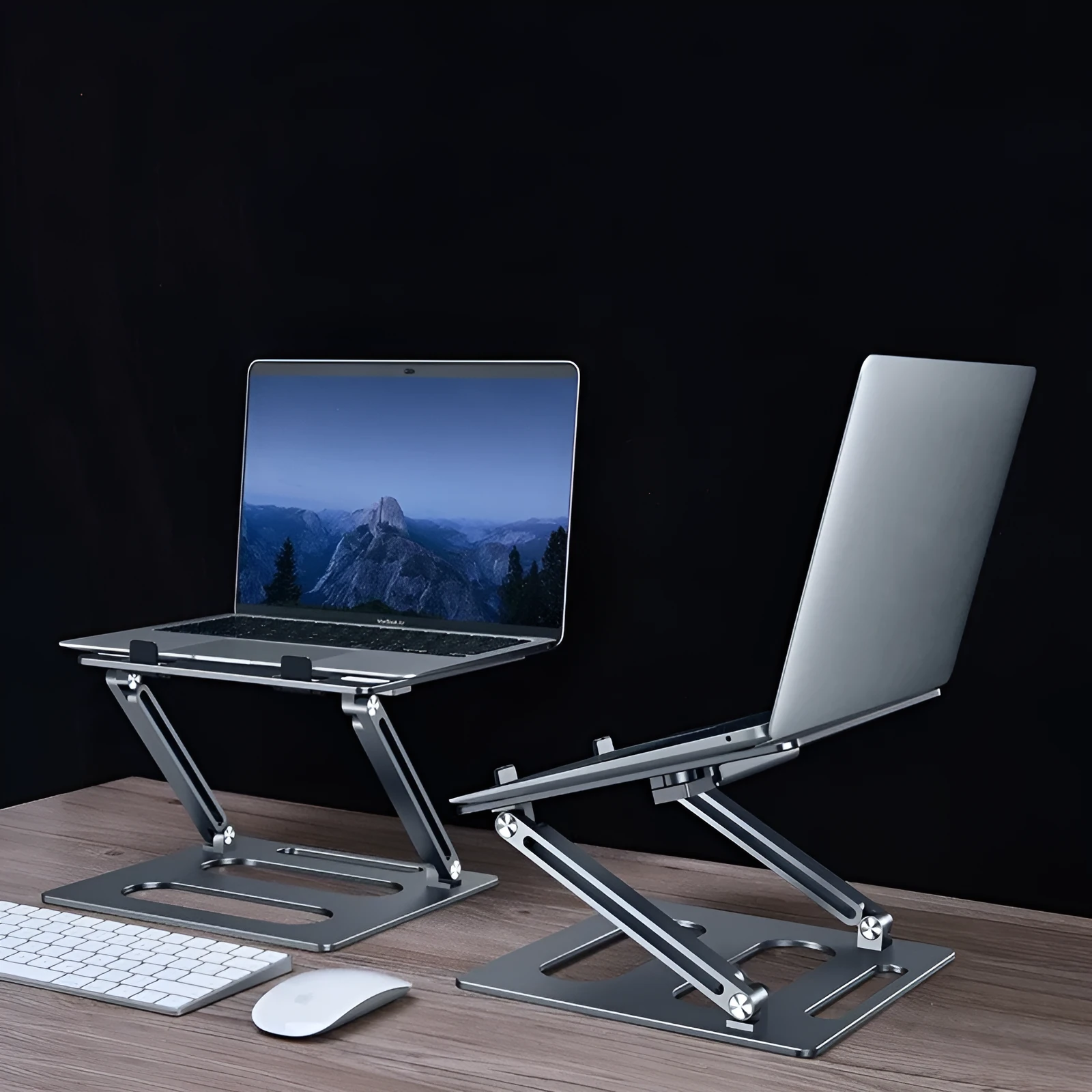 Silver adjustable aluminum laptop stand with laptop on desk at 340mm height