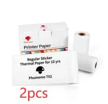 Phomemo T02 mini thermal label printer in white, showing front view with roll of sticky paper