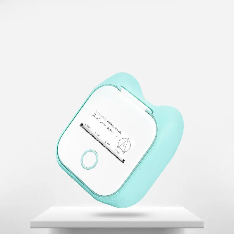 Phomemo T02 mini thermal label printer in white, showing front view with roll of sticky paper