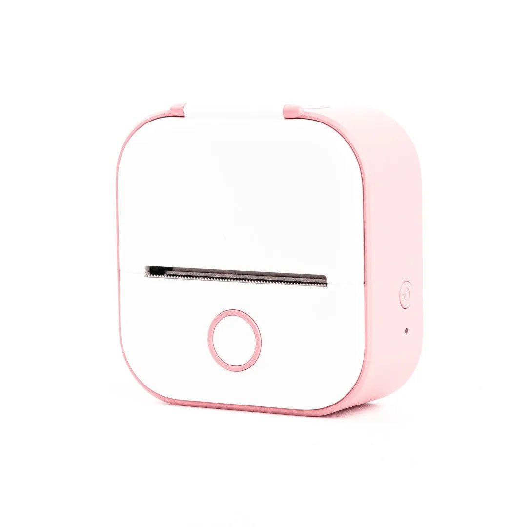 Phomemo T02 mini thermal label printer in white, showing front view with roll of sticky paper