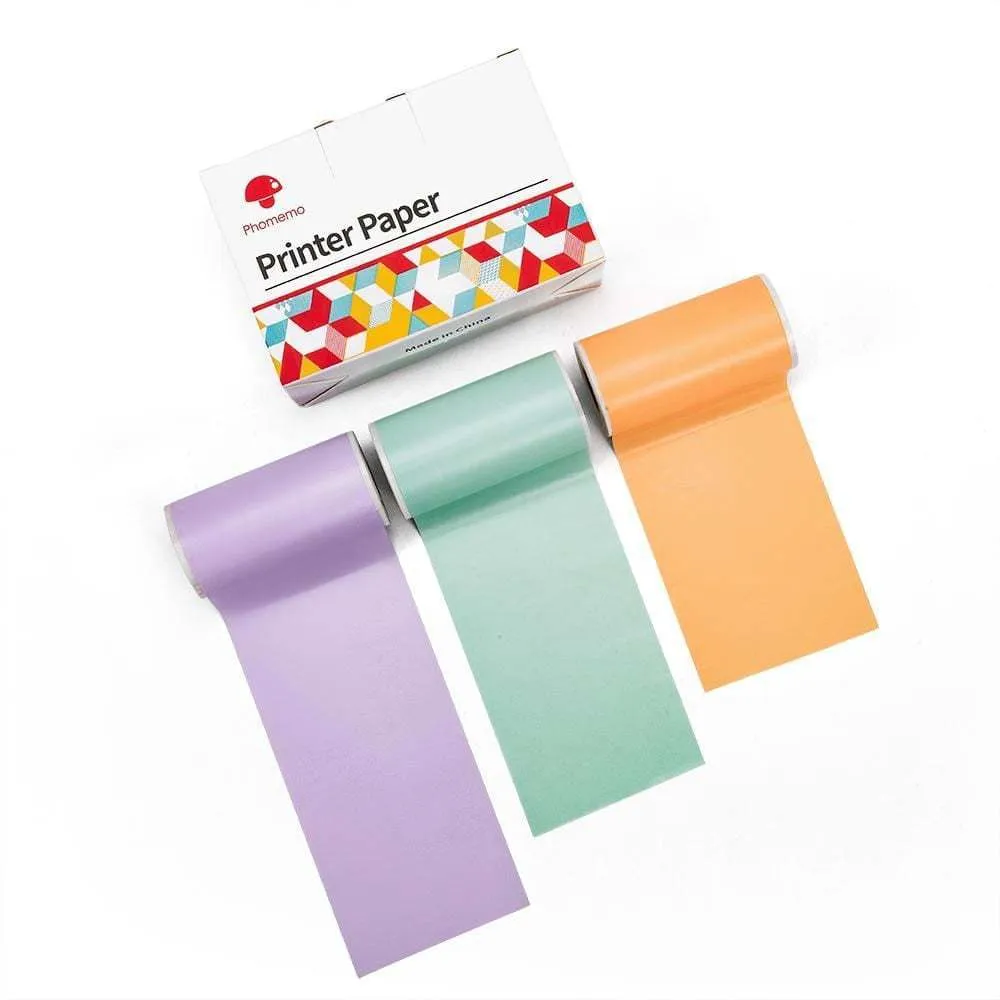 Phomemo T02 mini thermal label printer in white, showing front view with roll of sticky paper
