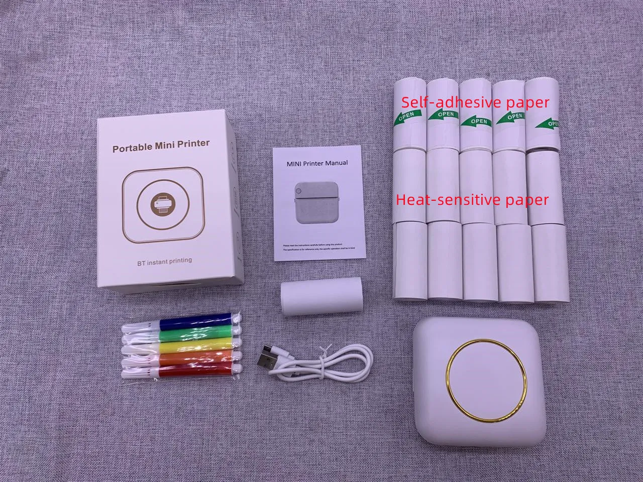 Mini label thermal printer C20 white model with Bluetooth and USB port on a desk