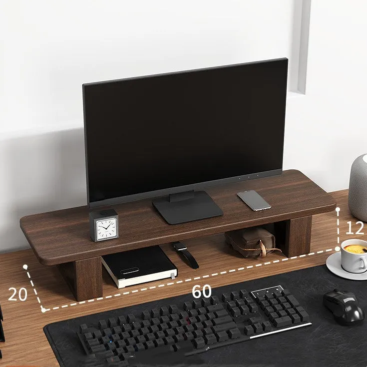 Solid walnut wood computer monitor heightening frame on a wooden desk with a keyboard stored below