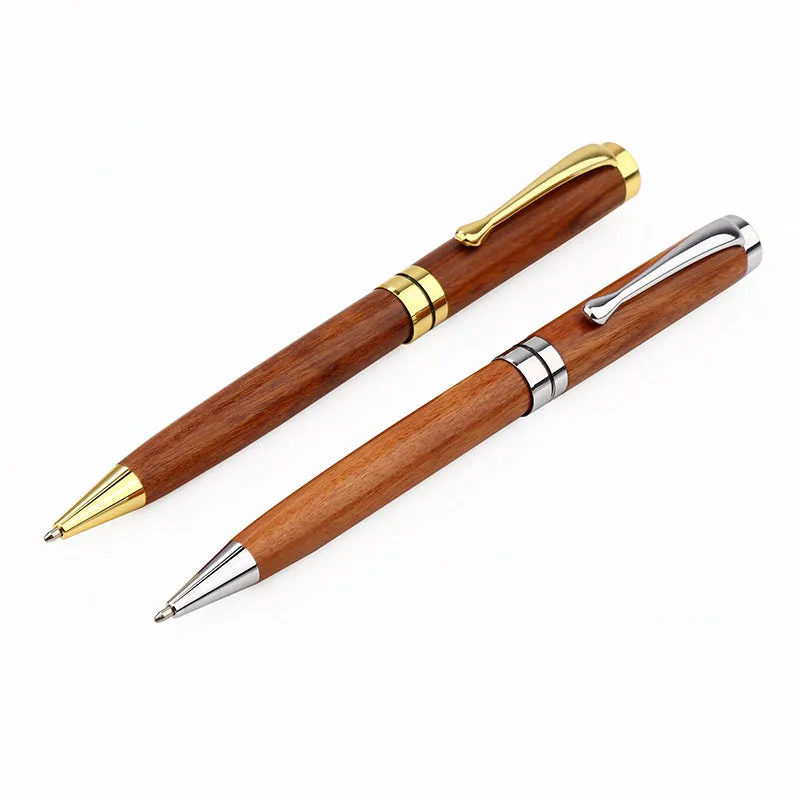 Gold metal and rosewood ballpoint pen 14cm long with cap
