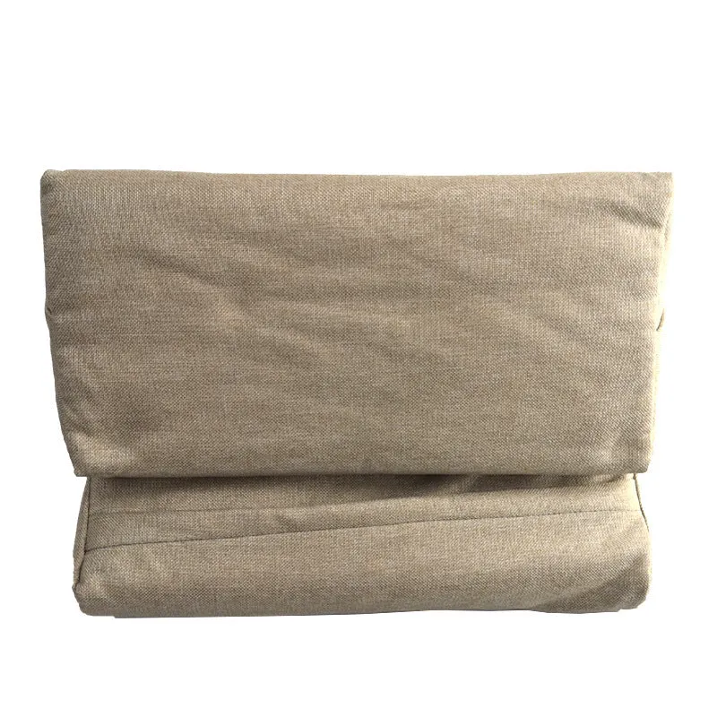 Candy-shaped tablet and phone support pillow with slow rebound fill, beige colour, on a bed