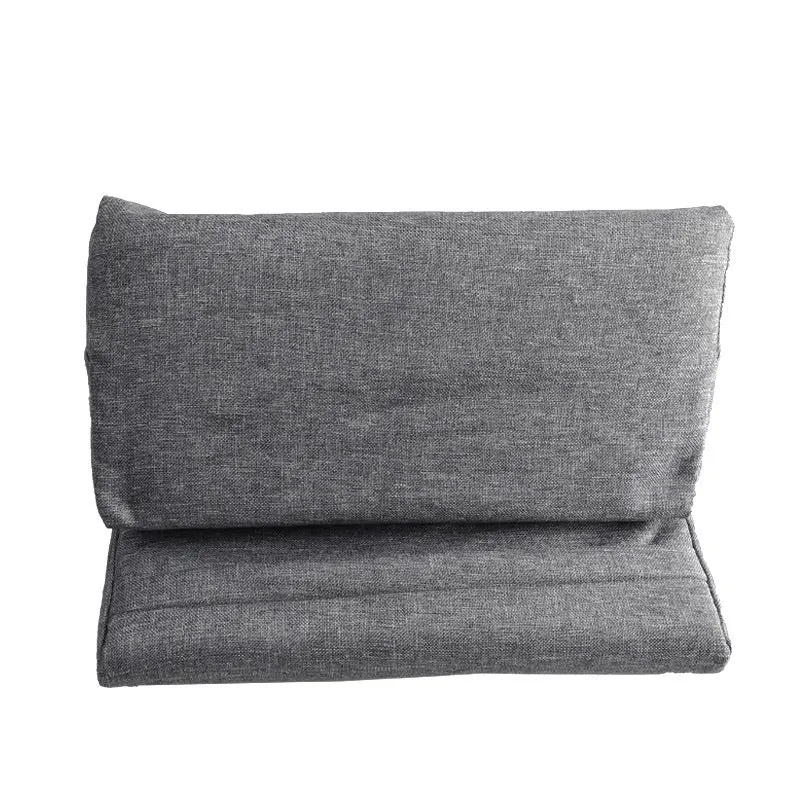 Candy-shaped tablet and phone support pillow with slow rebound fill, beige colour, on a bed