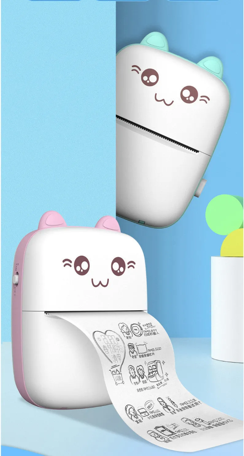 Pink mini Bluetooth thermal printer on a desk with a phone and printed note, measuring 11x8x3.5cm