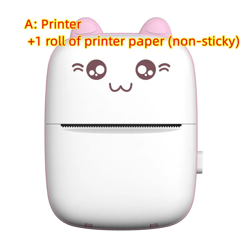 Pink mini Bluetooth thermal printer on a desk with a phone and printed note, measuring 11x8x3.5cm