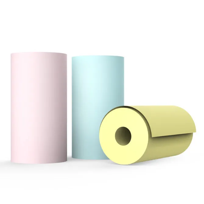 Pink mini Bluetooth thermal printer on a desk with a phone and printed note, measuring 11x8x3.5cm