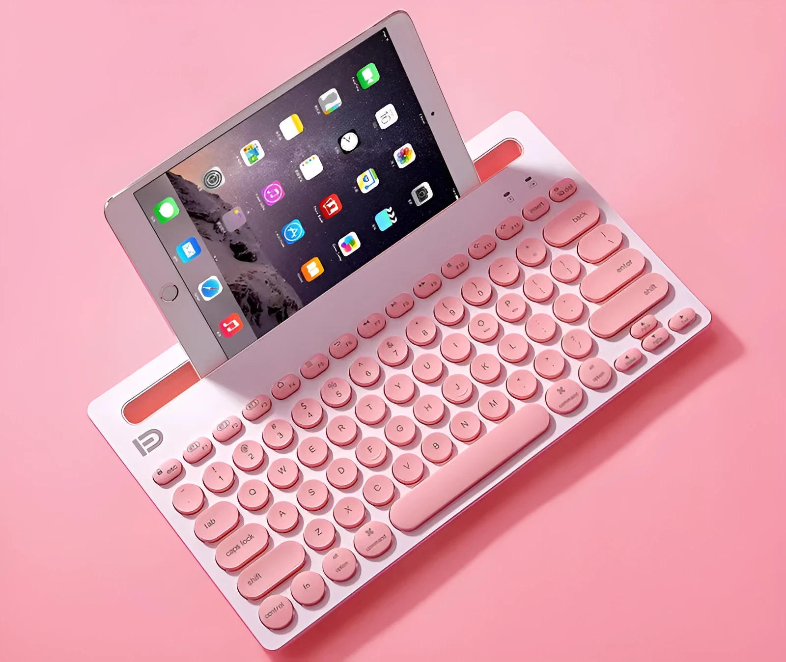 Wireless Bluetooth keyboard and mouse set in pink with storage bag