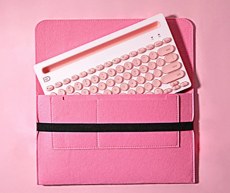 Wireless Bluetooth keyboard and mouse set in pink with storage bag