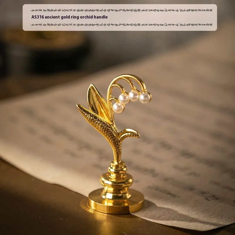 Wooden wax seal handle tool showing various style options like lily, owl platform, and Roman column designs.