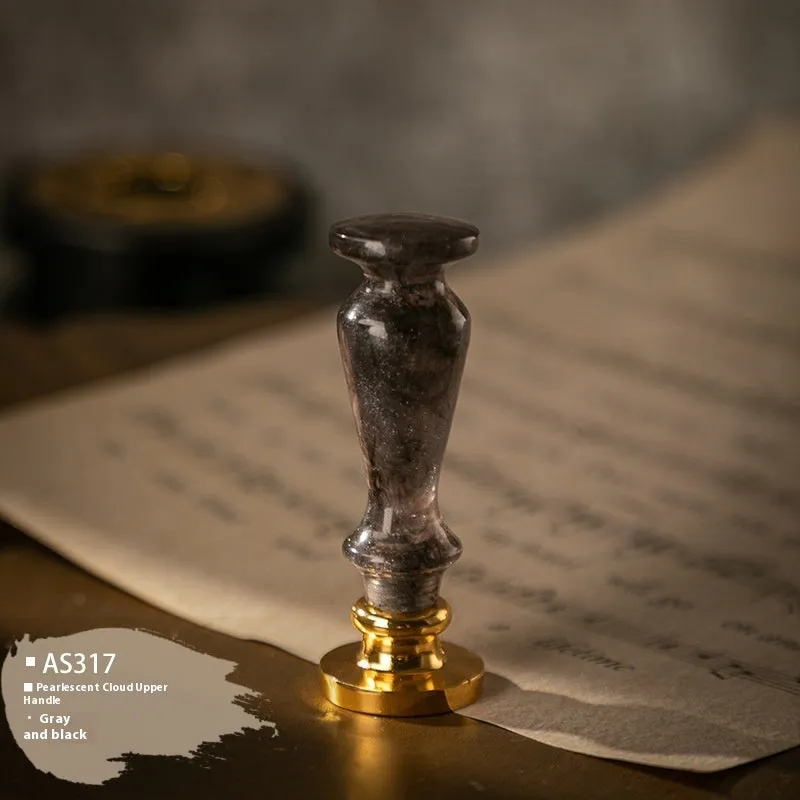 Wooden wax seal handle tool showing various style options like lily, owl platform, and Roman column designs.