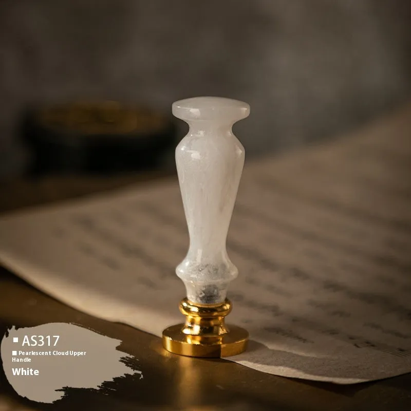 Wooden wax seal handle tool showing various style options like lily, owl platform, and Roman column designs.