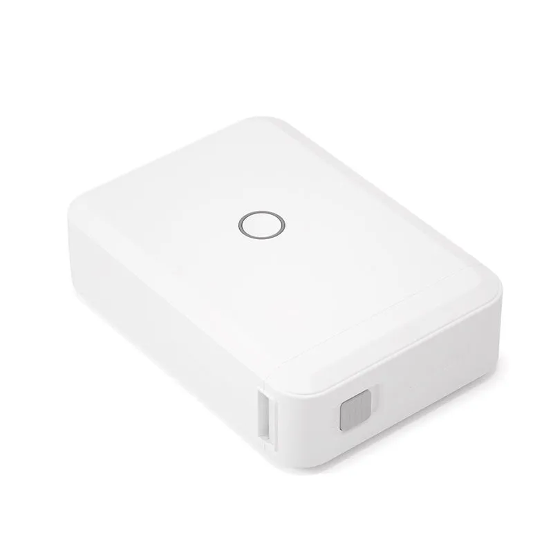 D110 thermal label printer in white with half-inch label roll, front view showing compact size and paper slot