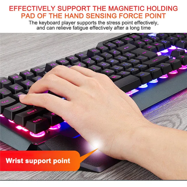 Black wired gaming keyboard with RGB backlight, floating keycaps, phone holder slot, pen slot, and card slot on a desk