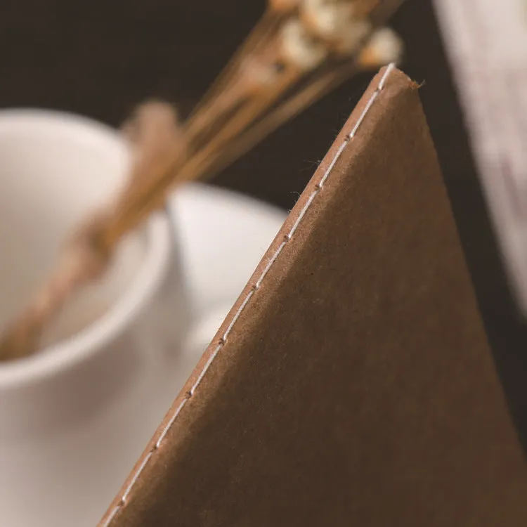 80g kraft paper notebook with blank pages, beige Dao Lin paper, and car thread stitch binding shown open on a flat surface