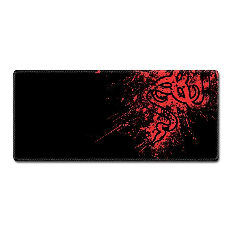 Oversized RGB gaming mouse pad with anti-skid rubber base on a desk, with cool lighting effect
