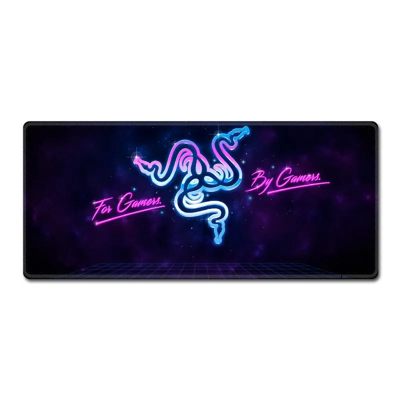 Oversized RGB gaming mouse pad with anti-skid rubber base on a desk, with cool lighting effect