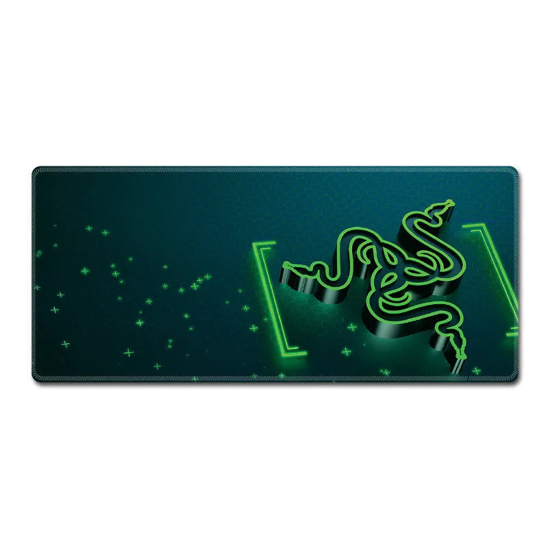 Oversized RGB gaming mouse pad with anti-skid rubber base on a desk, with cool lighting effect