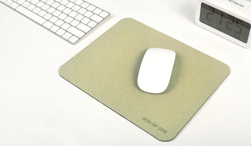 Cork portable mouse pad in green colour, 210x260x2.5mm size, lying flat on a desk surface