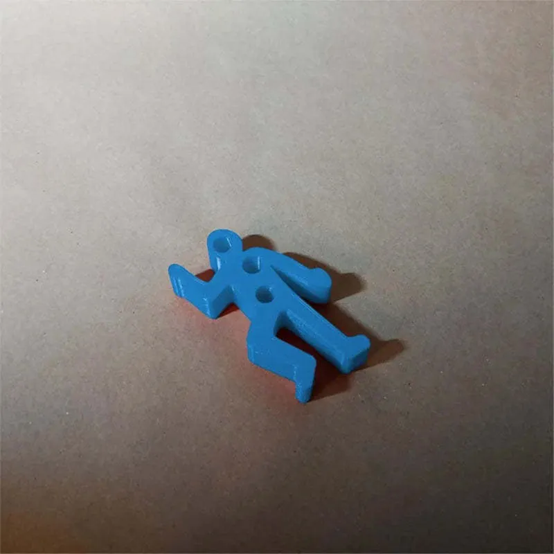 Funny crime scene humanoid pen holder in plastic triangle shape with pens inside, available in six colours