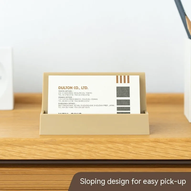 Creative PS business card storage display stand holding 20 cards in a geometric shape