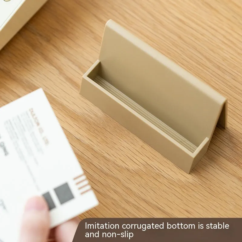 Creative PS business card storage display stand holding 20 cards in a geometric shape