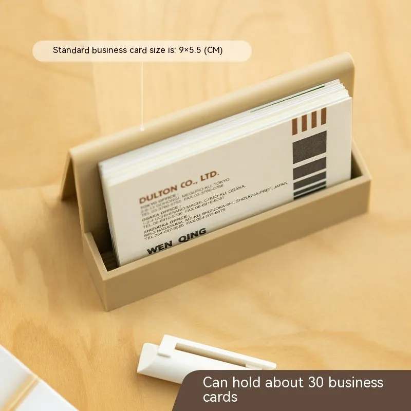 Creative PS business card storage display stand holding 20 cards in a geometric shape