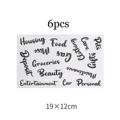 Assortment of handwritten labels, grid stickers, A6 rulers, and coloured sticky notes on a white background.
