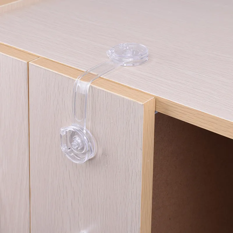 Transparent circular anti pinch child safety lock on a door handle