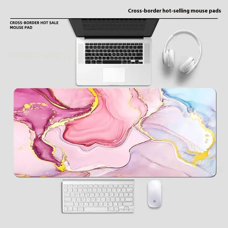 Large diatom ooze mouse pad with printed pattern, non-slip rubber sole, and polyester surface for desk use