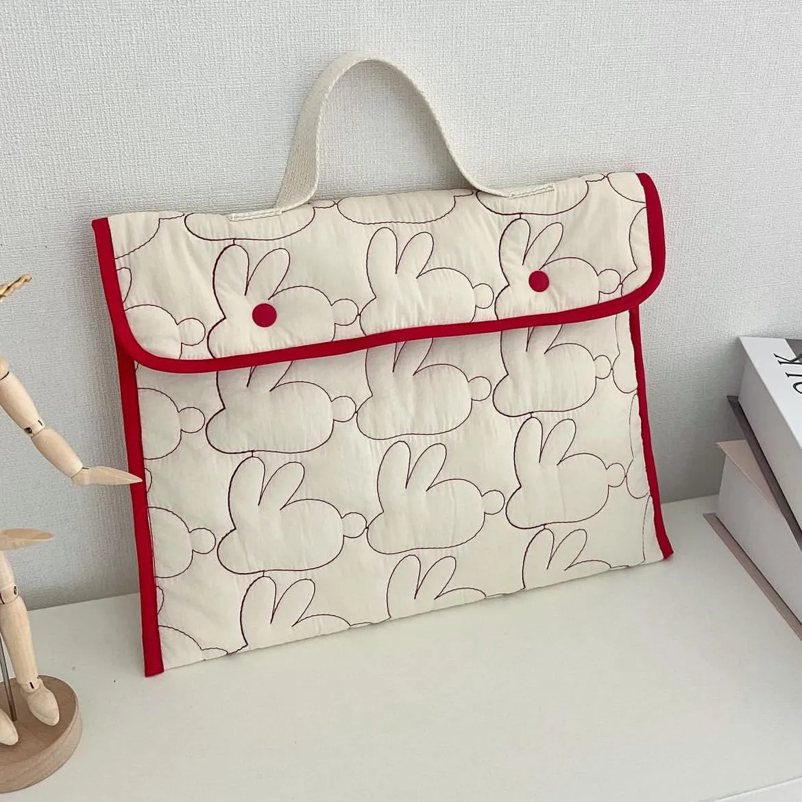 Embroidered rabbit pattern tablet storage bag in red rabbit colour, nylon material, 11 inch size