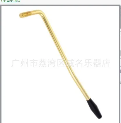 Metal electric guitar single shake crank tremolo arm in gold finish on a black background
