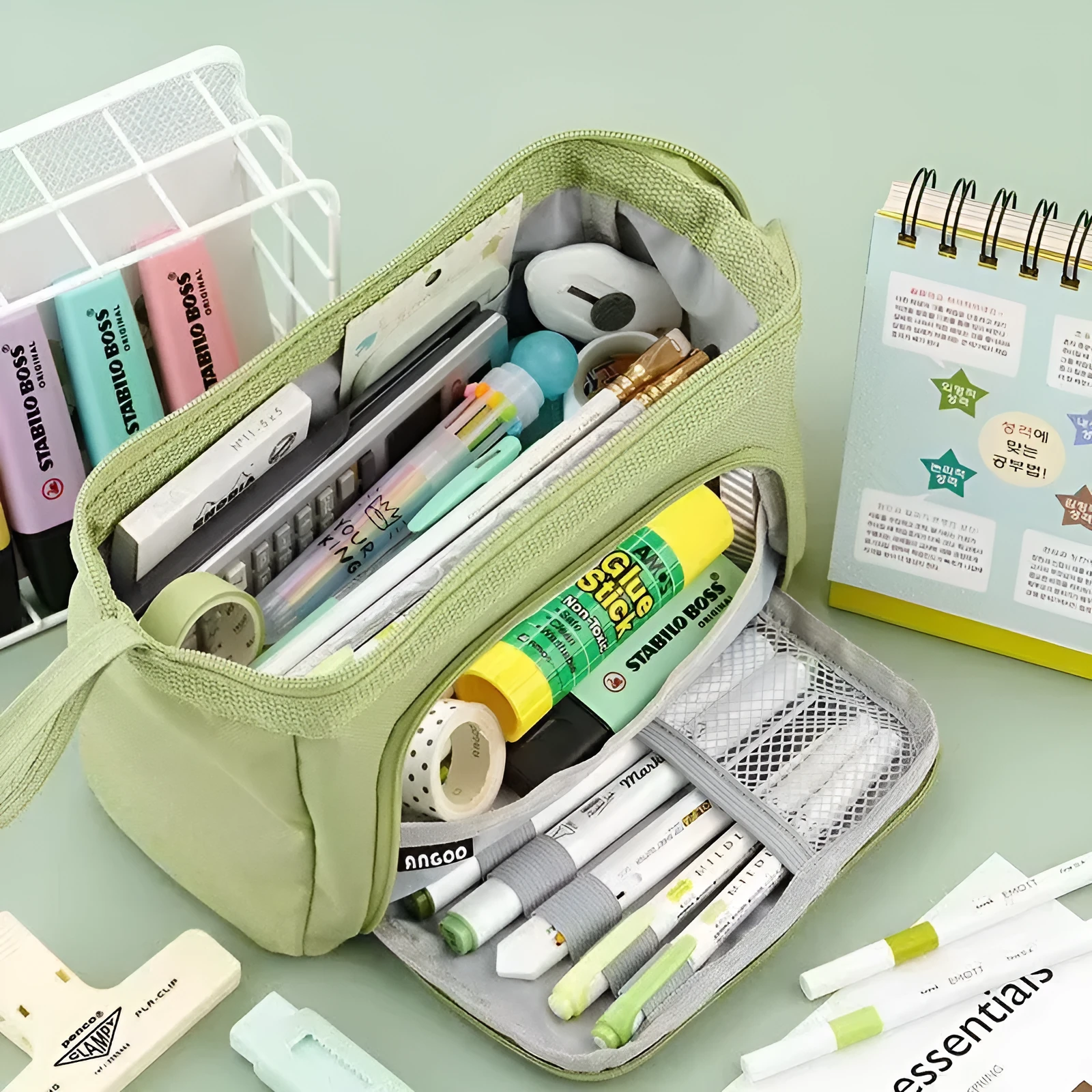 Double-layer canvas pencil case in pink colour, fabric material, for school or office stationery storage.