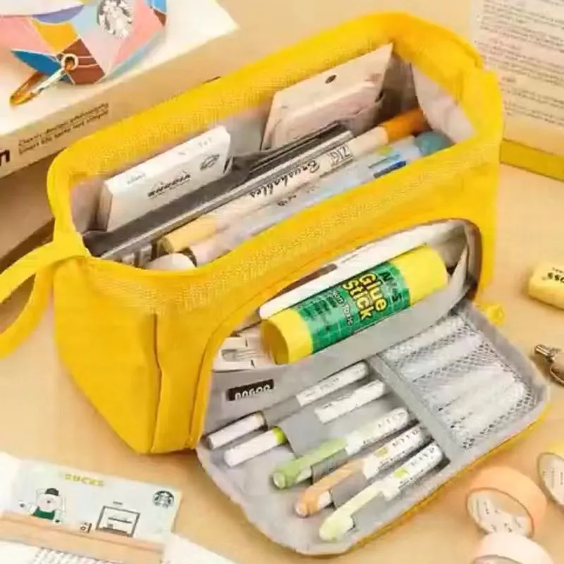 Double-layer canvas pencil case in pink colour, fabric material, for school or office stationery storage.