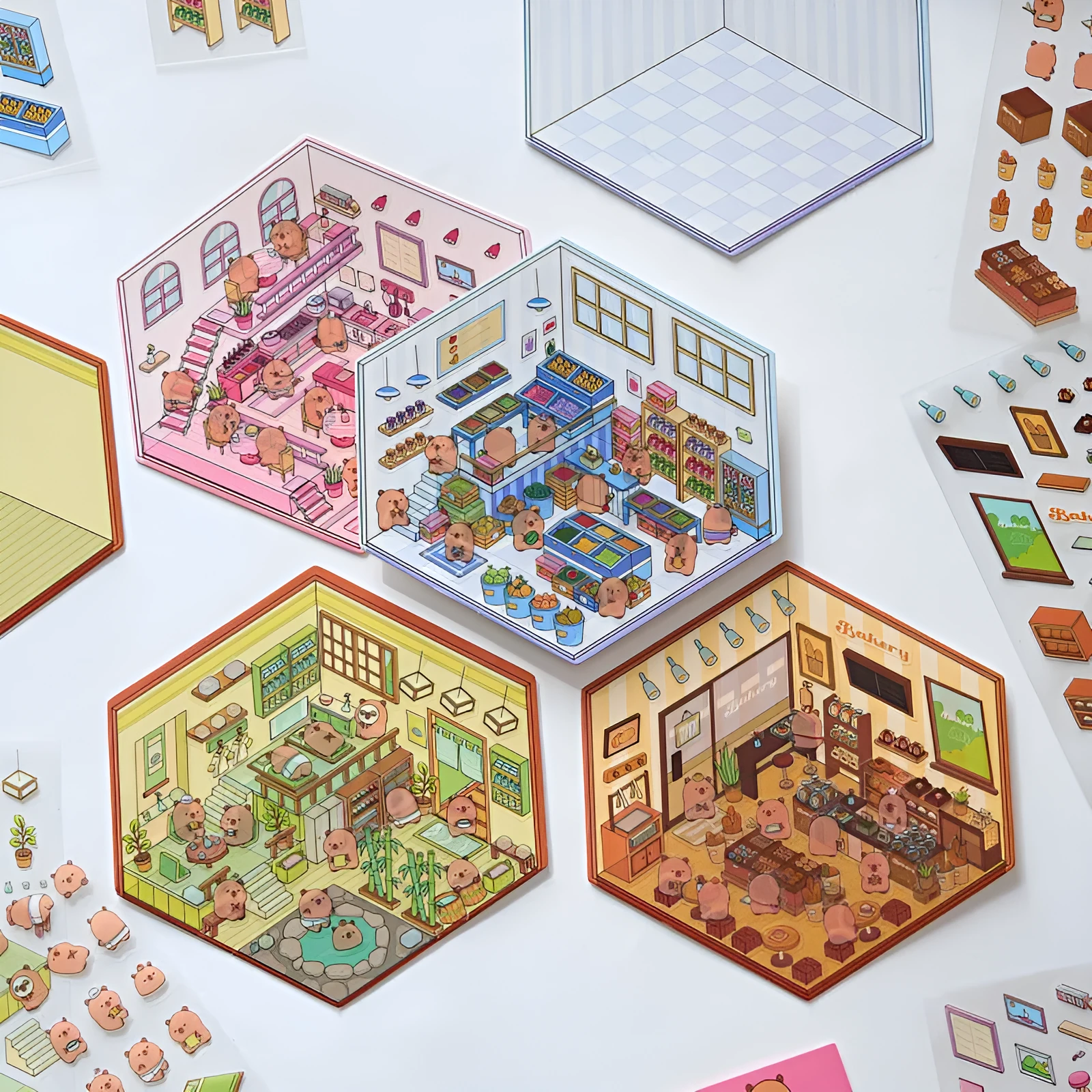 Pack of cut-free cartoon landscaping stickers showing bakery, bookstore, and flower shop scenes on a 190x125mm sheet.