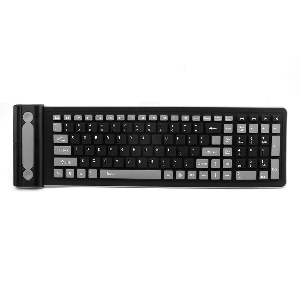 24g wireless mute folding silicone keyboard in folded position on a desk, showing USB receiver